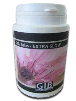 White bottle of GIB Industries CO₂ Tabs Extra Slow with pink flower label for aquarium use