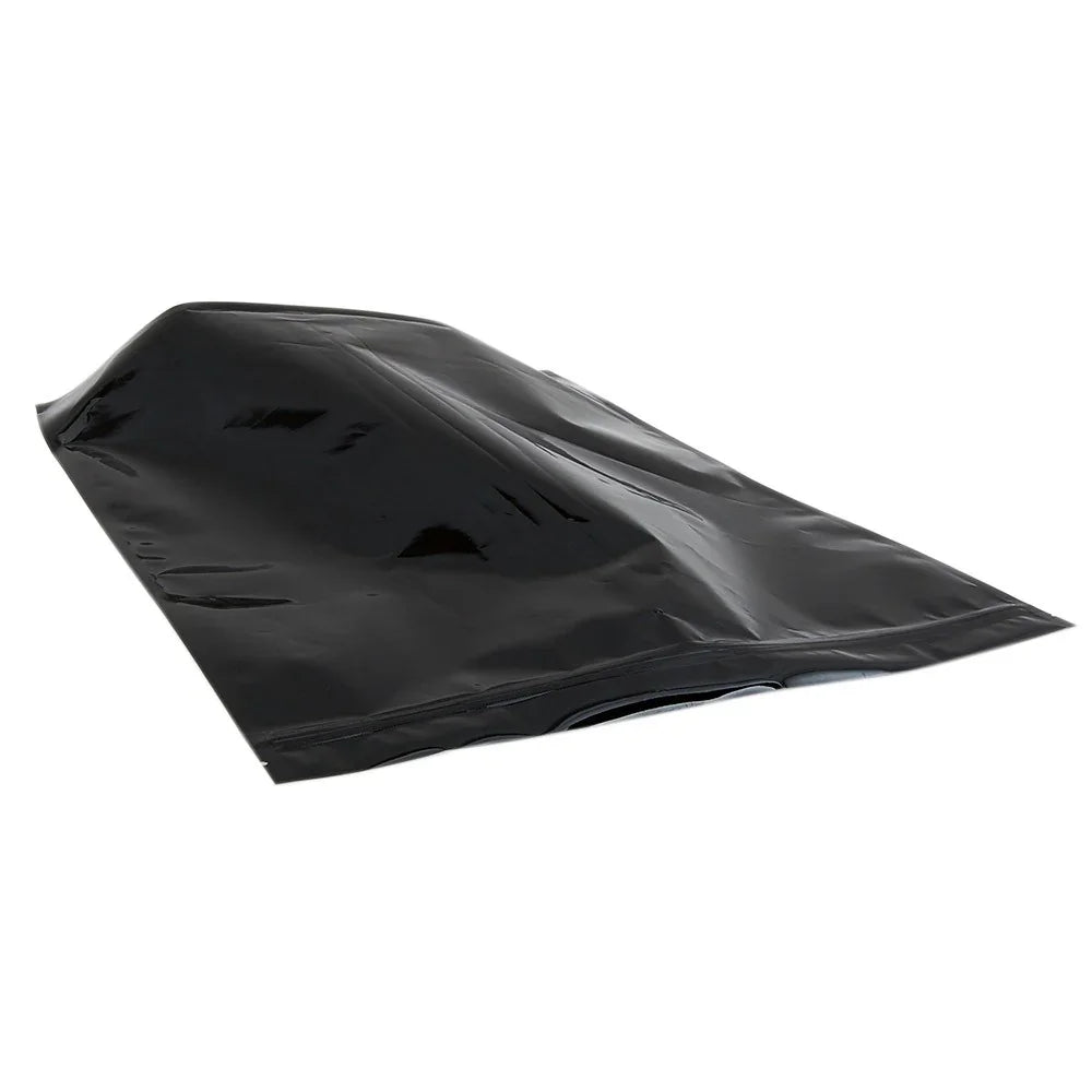 Glossy black polyethylene stand-up pouch with resealable zipper on white background