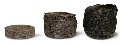 Three stacked coiled steel wool pads showing different thicknesses on white background