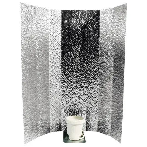 Reflector hood with textured silver stucco finish and white lamp socket on metal base
